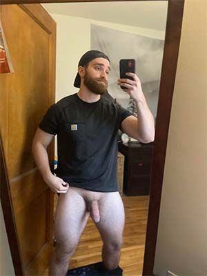 Super manly stud in Sammamish, WA with a thick beard is dropping his pants and showing the meat