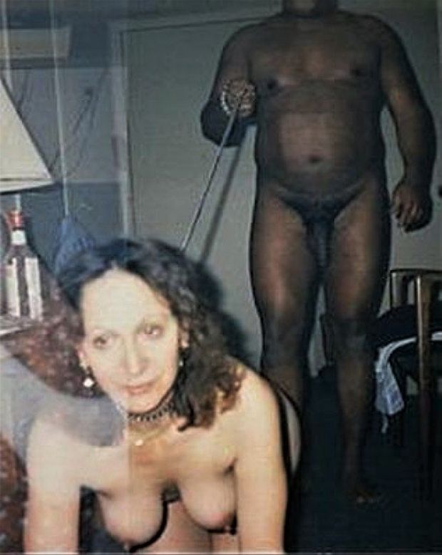 Vintage pic of a white woman being disciplined by her back master!