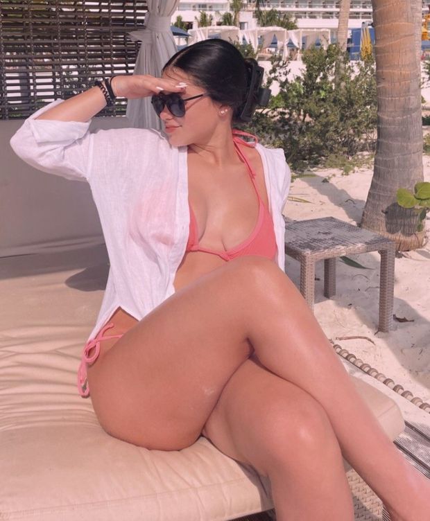 Ana in pink bikini showing boobs & legs