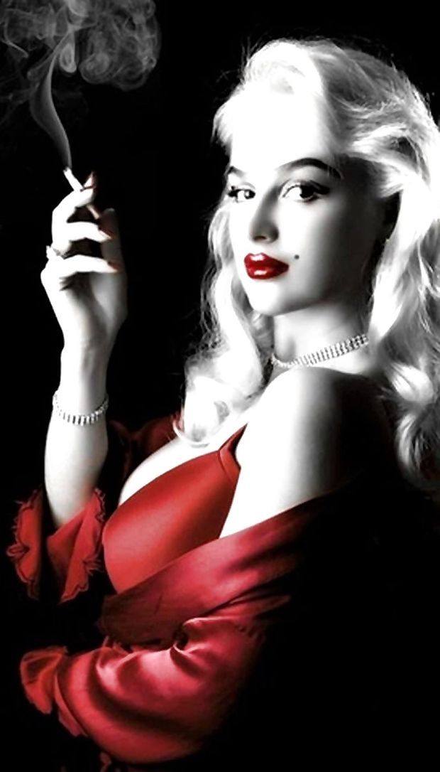 Classic pic of a gorgeous blonde having a smoke!