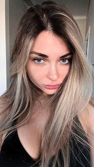 She got down on all fours in front of her friend and slowly pulled out her anal plug, silently inviting him to fuck her