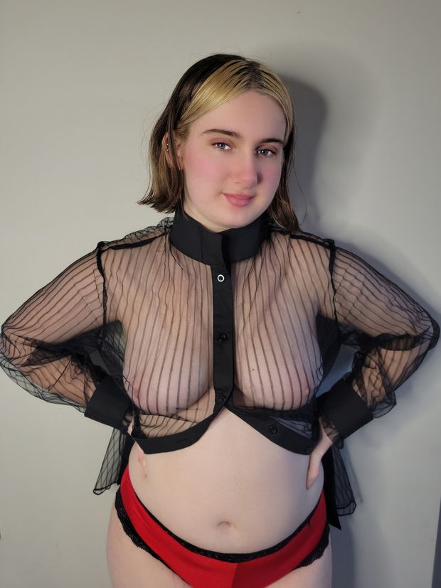 Stunning chubby blonde showing off tits through shirt