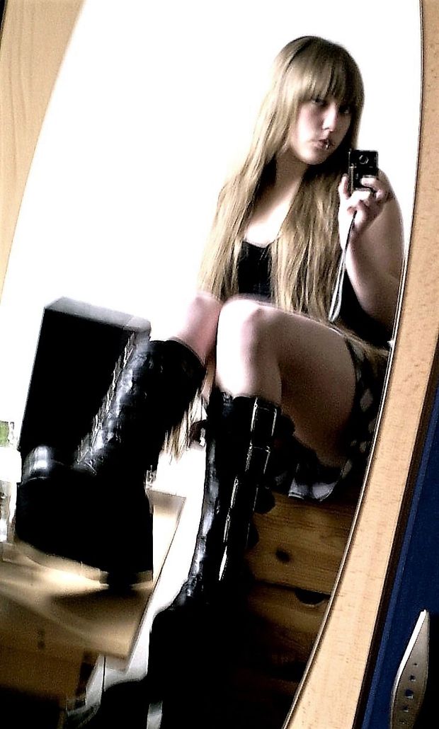 nice blonde gothic slut in big boots
