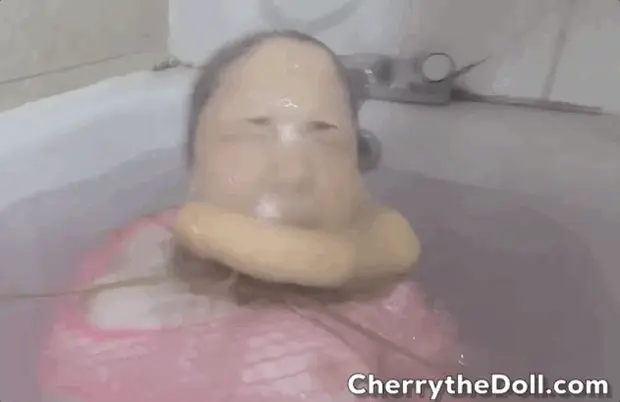 Dildo gagged water bondage