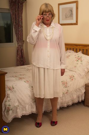 Slutty granny Rosemary toying her hungry old pussy in a red corset #2