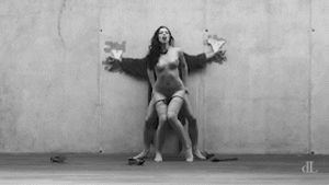 dL — crucifix on concrete