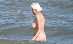 blimey is that old Mrs Walker from the post office.... i'd 1st class stamp that ass........