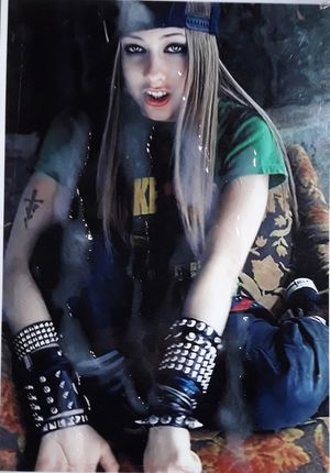 Sexy sk8er babe Avril Lavigne drenched in cum