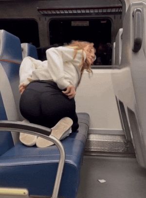 Cute tiny teeny flashing on a train