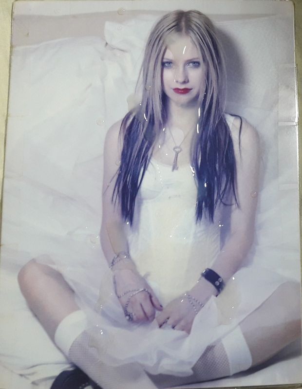 Canadian babe Avril Lavigne covered