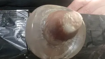 Cum in condom slowmo