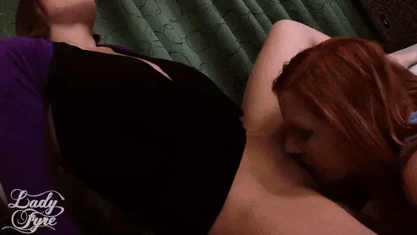 redhead and friend enjoying a suck