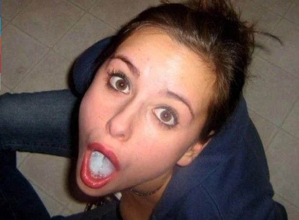 Brunette amateur showing off the load in her mouth