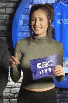 When this hostess laughs she presses her titties together & her braless wonders sprout twin nipple pokies