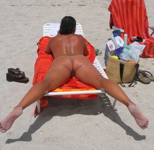 Milf mom sunbathing beach