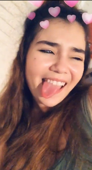 My adorable cousin with her tongue out