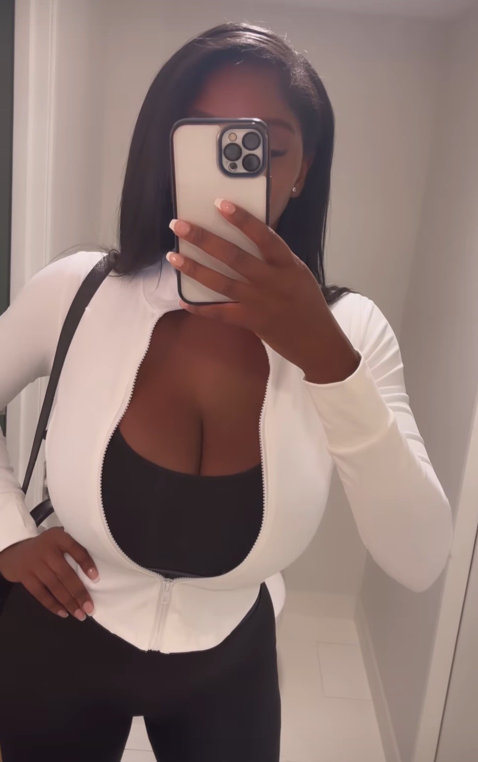 Ellie Mae mirror selfie open white jacket