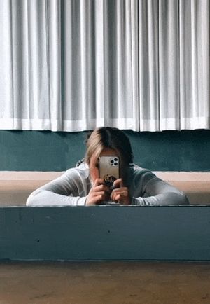 Blonde latina in green jean shorts