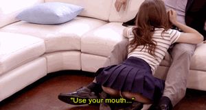 makes a cool blowjob and at the same time shows a juicy ass under her skirt