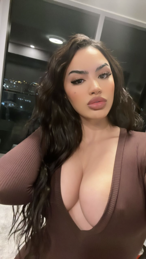 Incredible busty mixed babe popping out of her shirt