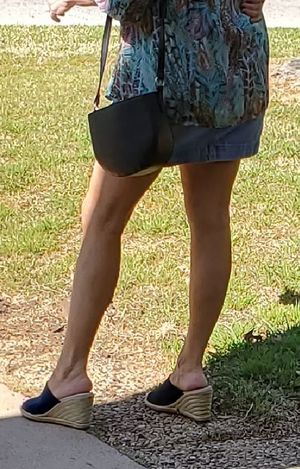 Wife waiting outside garage for me to pick her up--I napped a quick pic!