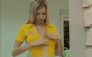 blonde with big tits undressing