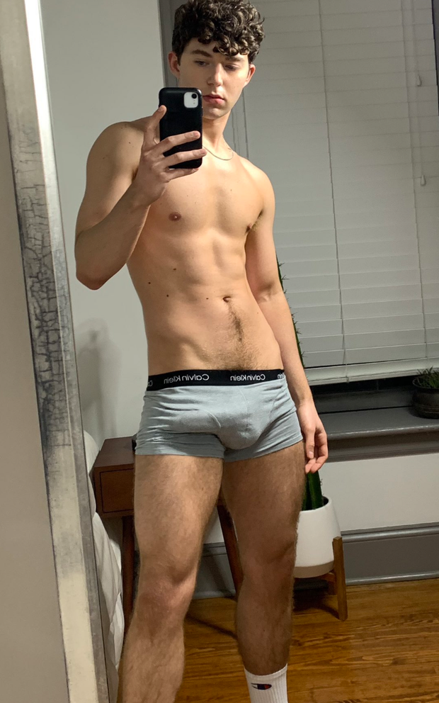 Bulge in his short boxers