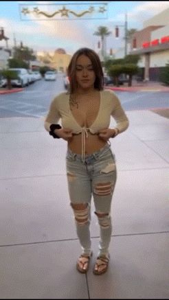 Caught flashing her tits in public