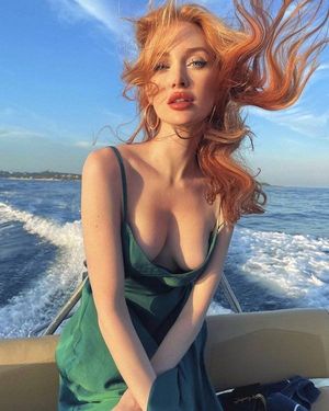 redhead on a boat