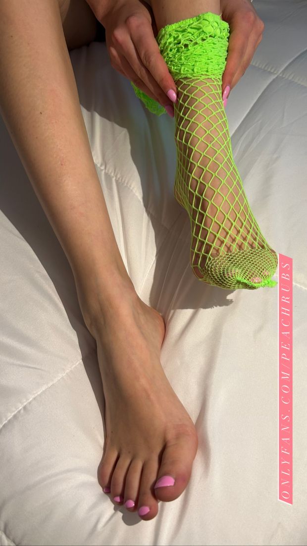 Pretty smooth feet with pink toe nails and high arches
