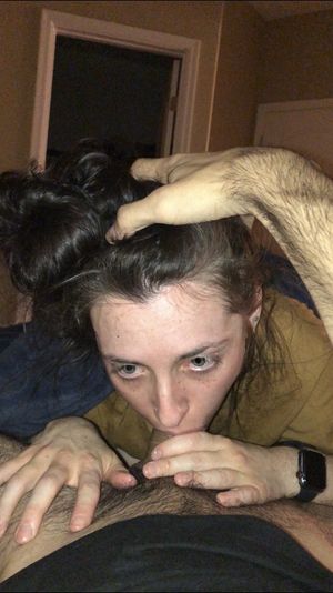 Brunette amateur sucking on some cock