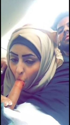 Beautiful woman in hijab sucking cock