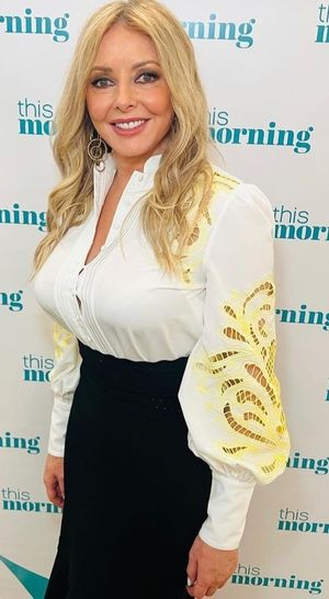 Carol white top black skirt