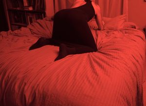 Black dress, red light