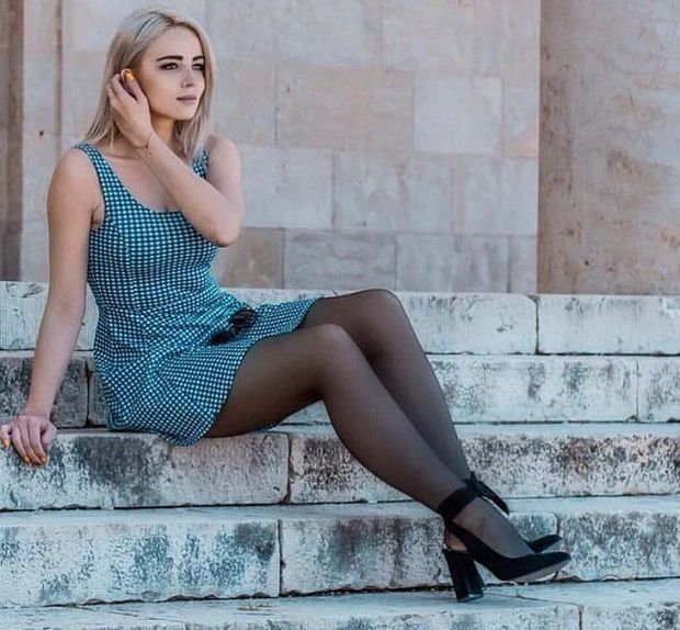 classy blonde on the stairs