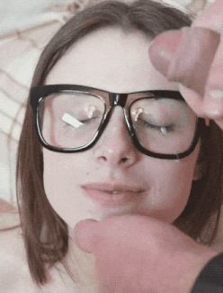 the sperm is ejaculated on the glasses of this slut