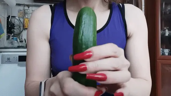 Red nails & a cucumber.