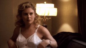 Drinking whisky off her tits