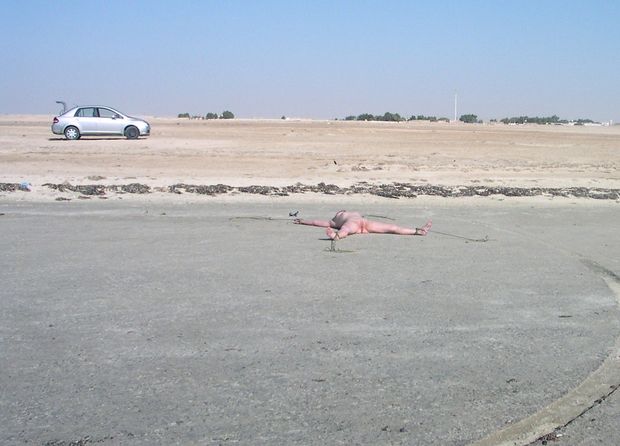stakedout naked outside