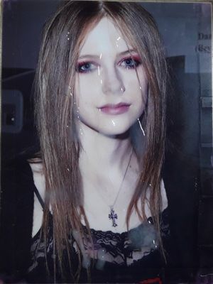 Beautiful babe Avril Lavigne drenched