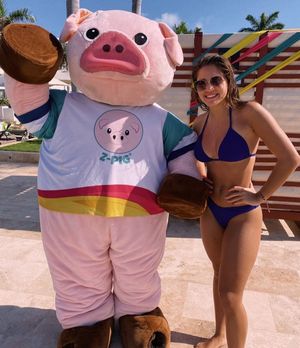Taylor & pig on beach