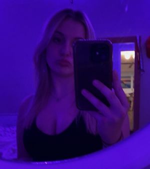 Keyra mirror selfie purple cleavage