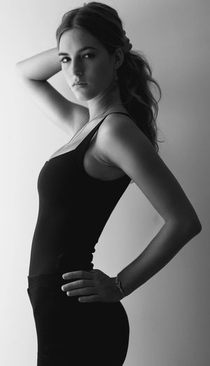 Emily black dress side on