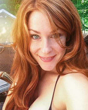 Playful and Coy Redhead