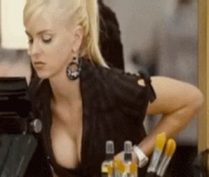 Giving herself a boobs massage