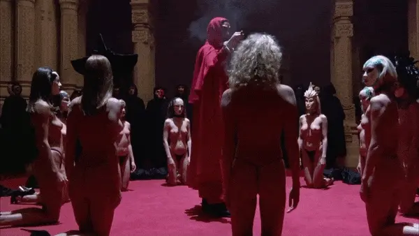 Exquisite ladies passing a stylized kiss during the orgy preparation ritual 3 - Eyes Wide Shut Orgy