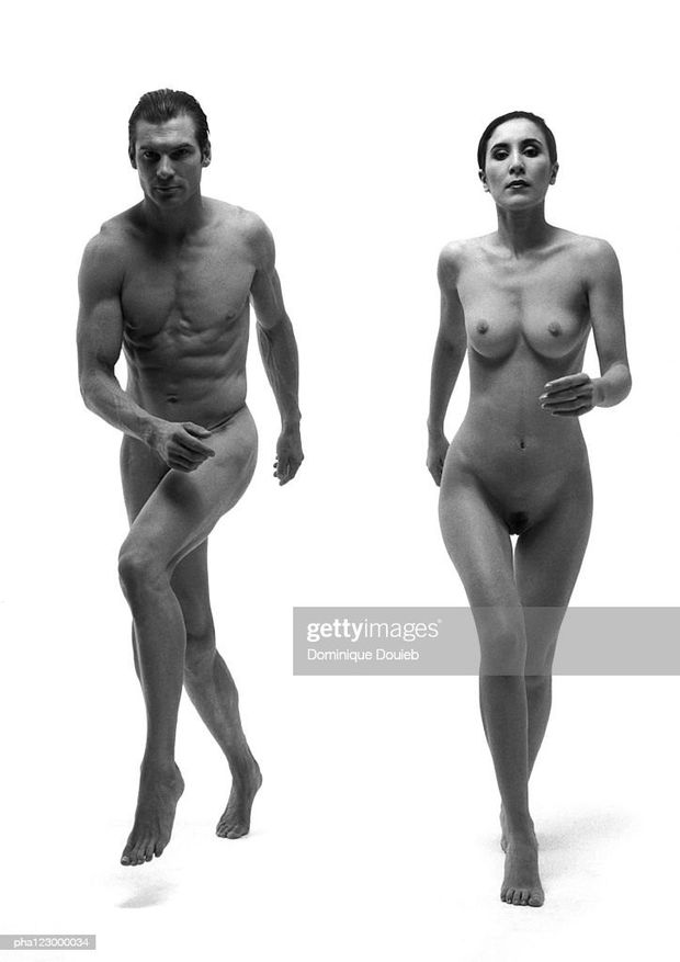 Man and woman running naked