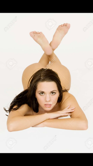 Naked brunette with cheeks poking up