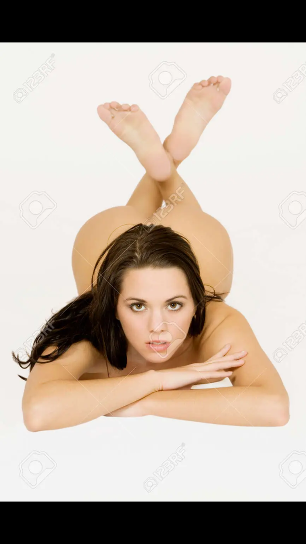 Naked brunette with cheeks poking up