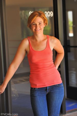 Shy redhead Jodi strips down naked and toys her innocent shaved pussy #1